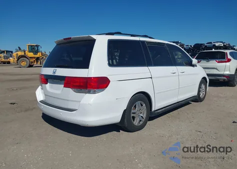 2010 Honda Odyssey Ex-L z USA, uszkodzony, nr VIN 5FNRL3H65AB007439